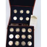 A cased set of 18 sterling silver £5 coins celebrating the golden age of steam, Jersey issue 2006,