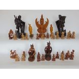 A box containing a large quantity of eastern treen and carvings to include mainly figures.