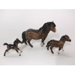 A Beswick model of a shetland pony and shetland foal together with a further Beswick model of a