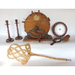 A Victorian oak table knife sharpener together with a pair of open barley twist candlesticks, an