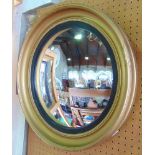 A Regency style convex gilt wood wall mirror together with two further Empire style gilt metal