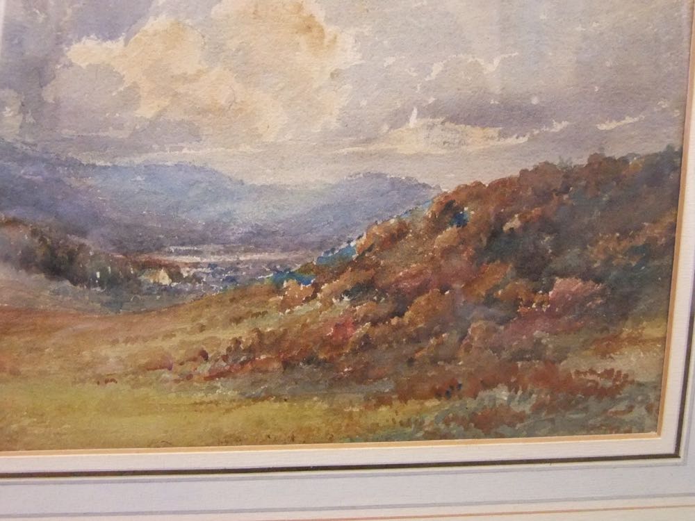 An early 20th century watercolour study of a mountainous landscape, 16 x 27 cm in a moulded gilt - Image 2 of 4