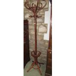 A Bentwood hat coat and stick stand of full height.