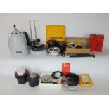 A collection of photographic developing equipment together with a collection of 8mm cartoon films,