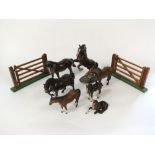 A collection of Beswick and other models of horses and ponies all with brown colourway including a