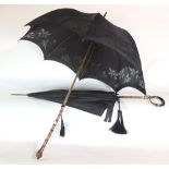 Two good 19th century parasols, one with elaborate horn crook handle with gilt metal art nouveau