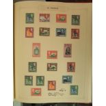 A mostly mint GB Commonwealth stamps collection in an album. (Displayed in cabinet)