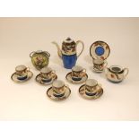 A collection of Japanese eggshell porcelain Samuri coffeewares comprising coffee wares, sugar