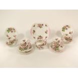 A six place Shelley china tea service with printed blackberry and bramble decoration and scalloped