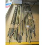 A miscellaneous collection of several sets of brass stair rods in various patterns