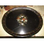 A large 19th century laquered papier mache serving tray with mother of pearl and painted floral