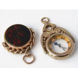 A 9ct gold compass watch fob, together with a swivel fob set with bloodstone and carnelian, 12g