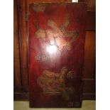 A Chinese laquered timber panel (one piece) with carved script. 62cm x 120cm