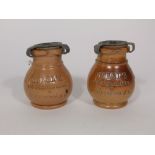 A pair of 19th century Doulton Lambeth stoneware pots and covers with impressed inscription Morel'