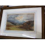 An early 20th century watercolour study of a mountainous landscape, 16 x 27 cm in a moulded gilt