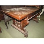 A Spanish style walnut refectory or centre table of rectangular form raised on stretcher base with