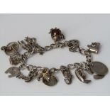 A silver charm bracelet, 45g