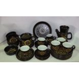 A quantity of Denby Arabesque pattern wares including coffee pot, tea pot, milk jug, sugar bowl, six