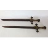 A pair of Victorian Bandsmen Hanger swords, 62 cm long approx (2).