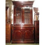 Good quality reproduction Victorian style library bookcase the lower section enclosed by two arch