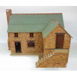 A good quality scale model of a farm house with terracotta brick work, interior slate flooring,