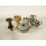 A small collection of Denby stonewares with brown striped decoration on a mottled grey ground