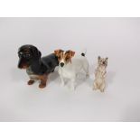 A Beswick model of a standing dachshund, further Beswick model of a standing jack russell terrier,