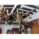 Large Dutch style brass stepped ceiling light with long scrolled branches