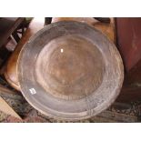 A primitive turned wood dairy bowl, 60 cm diameter