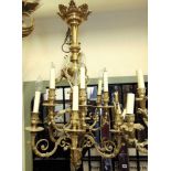A very good quality cast brass 10 branch chandelier, the arms with scrolled and acanthus detail, the