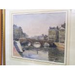 An early 20th century charcoal and watercolour study of a city riverscape with triple arched bridge,