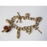 A 9ct gold charm bracelet, 31.5g