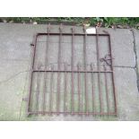 A 19th century wrought iron pedestrian gate with vertical rails and spear finials, 3 ft wide