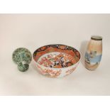 A large Imari style punch bowl with painted character marks to base, 39 cm diameter, together with a