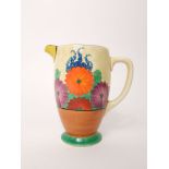 A Newport Pottery Clarice Cliff Bizarre jug in the Gay Day pattern with orange, purple and blue