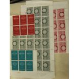 An accumulation of stamps from Belgium in a stock album and in sheets & part sheets