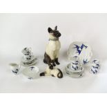 A large Beswick model of a seated Siamese cat with impressed number to base 2139 and associated