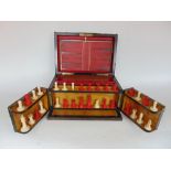 A good 19th century coromandel and gilt metal games compendium, the hinged front enclosing an
