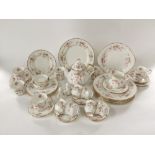 A quantity of Paragon china Victoriana Rose pattern wares comprising six dinner plates, six