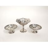 A pair of silver pedestal silver bon bon dishes with pierced rims, maker A G Co Ltd, Birmingham