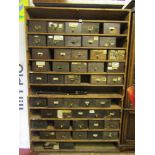 A set of vintage stripped and waxed pine racking containing a large quantity of pine drawers, many