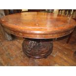 A 19th century Chinese hardwood centre/tea table, the circular top profusely inlaid with bamboo,