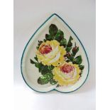 A 19th century Wemyss heart-shaped dish, centrally decorated with two yellow roses,30 cm long