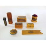Seven pieces of mauchlineware treen to include pin cushion, matchbox holder, etc