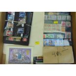A box containing a quantity of commonwealth stamps on postcard size display cards including some