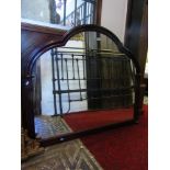 An overmantle mirror with moulded frame