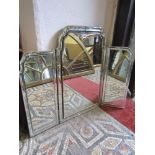 A good quality Venetian style triple folding dressing table mirror with bevelled edge plates and