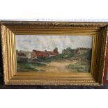 A substantial early 20th century oil painting on canvas of red roofed farm buildings, signed