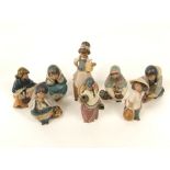 A collection of eight Lladro Daisa matt glazed figures including a pair of Inuit children, three