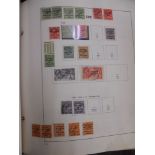 A Davo album containing a collection of stamps from Ireland, earlies to 1998, mint and used and